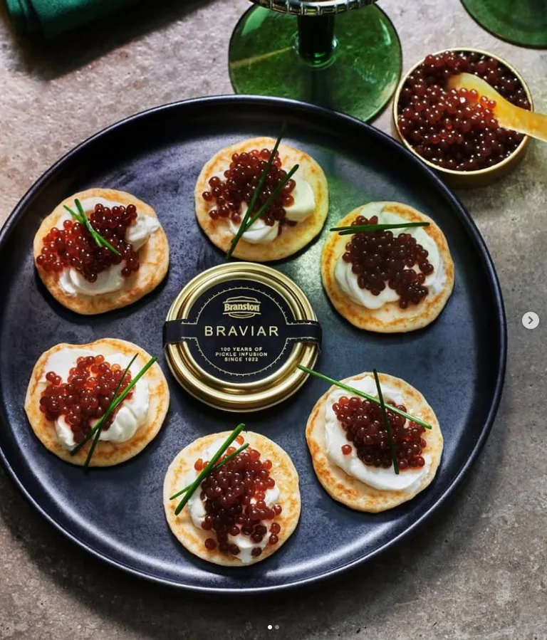 Branston Caviar served on blinis by The Robin Collective
