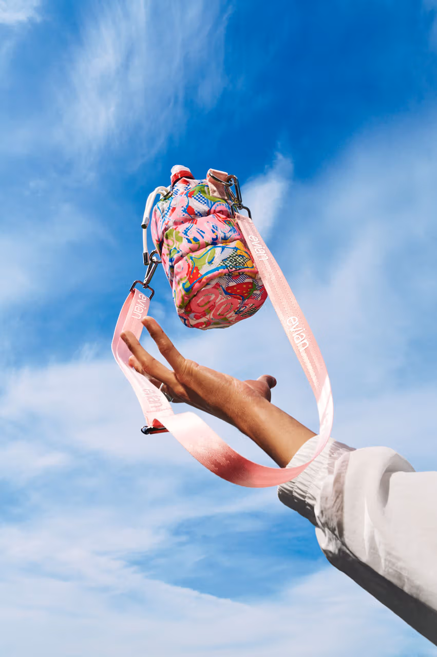 evian 200 Years Young bottle bag reveal packaging with premium tissue print - The Robin Collective