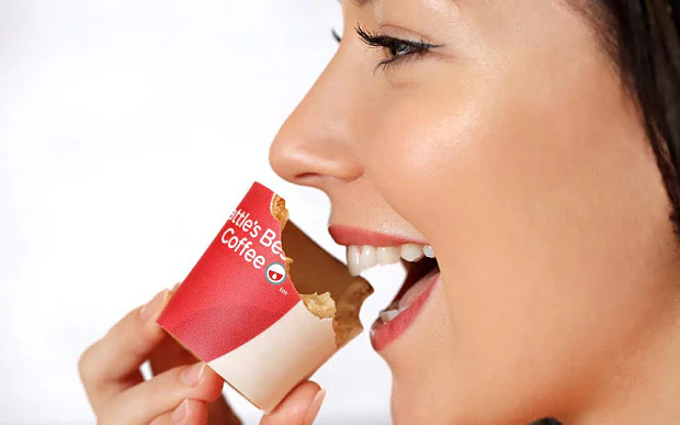 Close-up of the edible KFC Scoff-ee Cup being eaten, revealing white chocolate lining