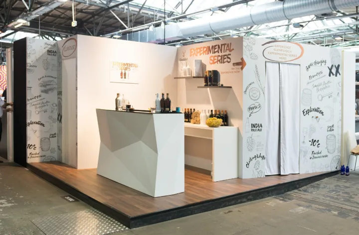 Glenfiddich Experimental Series trade stand with sketched illustrations and tasting bar