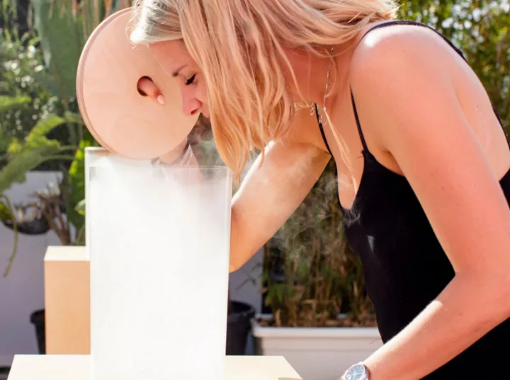 Woman experiencing the Pinterest sensory mist installation at Cannes Lions
